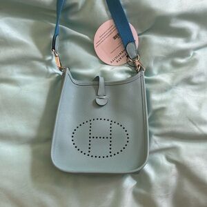 Hermes Evelyn’s TPM  BLEU Atoll with blue fabric contrasting strap. Auth
